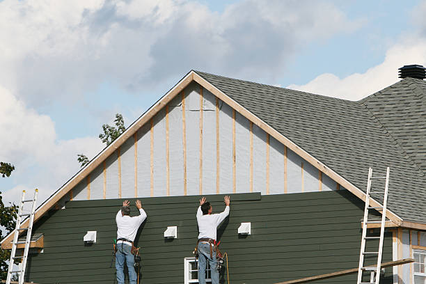 Professional Siding Contractor technician working in Purlear, NC